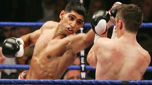Amir Khan l-ar putea întâlni în 2015 pe Floyd Mayweather