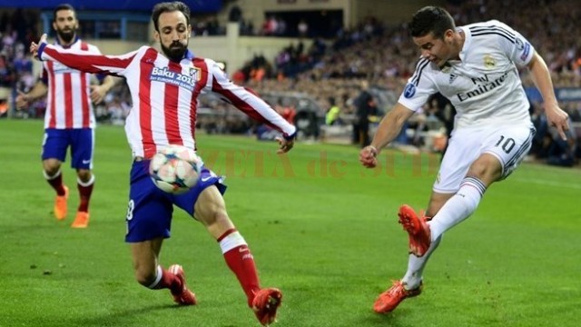 James Rodriguez (în alb) a făcut o partidă bună pe "Vicente Calderon" (foto: uefa.com)