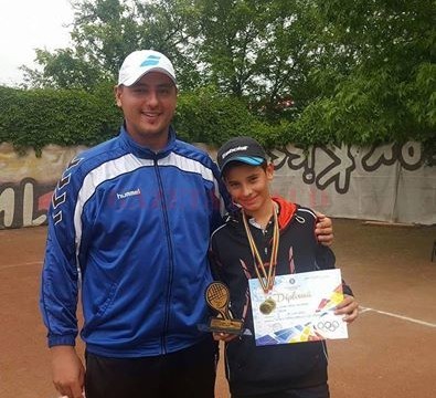 Alex Coman alături de antrenorul său, Alex Banciu