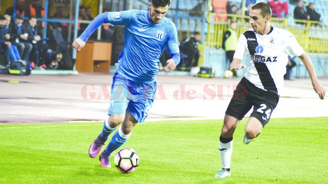 Andrei Ivan (la minge) şi colegii săi s-au întors cu un punct de la Mediaş (Foto: csuc.ro)