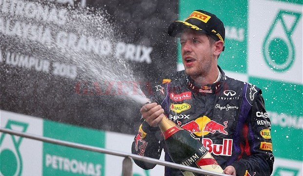 Vettel a sărbătorit cu șampanie succesul din Malaezia