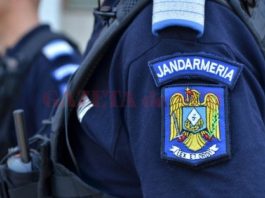 Jandarm înjunghiat de un bărbat care ameninţa că se aruncă de la etaj