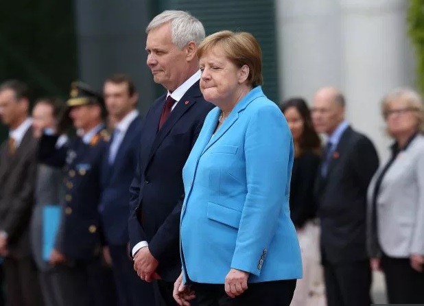 Pentru a treia oară în trei săptămâni, Merkel tremură din nou