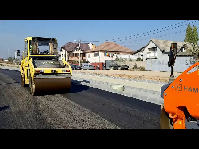 VIDEO / A început turnarea asfaltului pe strada Carpenului
