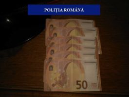 Poliţiştii spun că au ridicat 23 de bancnote de 50 de euro care aveau aceeaşi serie.
