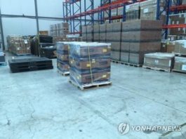 Cutii de kituri de testare coronavirus fabricate în Coreea de Sud sunt depozitate în apropierea Aeroportului Internațional Incheon înainte de a fi expediate