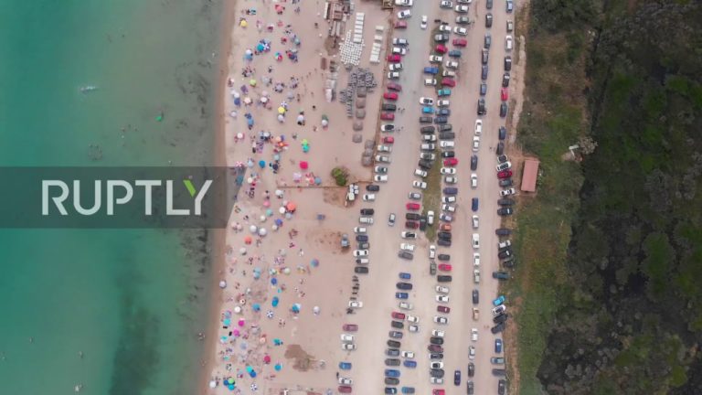 Plajele și parcurile din Europa, pline de oameni, în timp ce în SUA oamenii sunt așezați în cercuri pictate