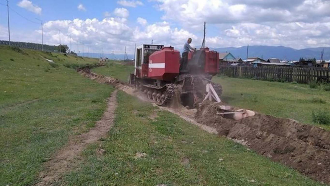 Un sat rusesc, băgat în carantină cu tranșee anti-coronavirus