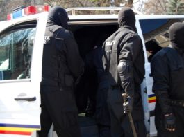 DIICOT și Poliția Judiciară fac percheziții la grupări de crimă organizată din București și 28 de județe