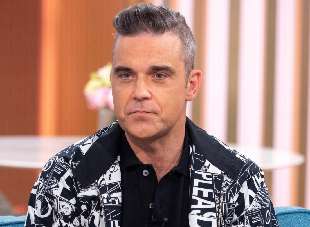 Cântăreţul Robbie Williams, infectat cu Covid-19