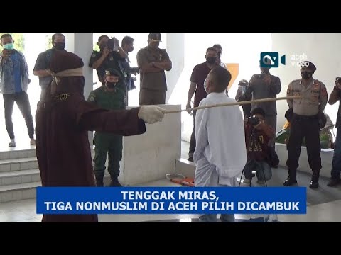 Doi indonezieni, biciuiţi că au consumat alcool şi au jucat jocuri de noroc