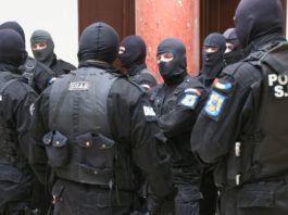 Percheziții în Harghita, inclusiv la sedii de poliție