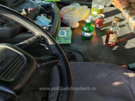 Șofer român de TIR prins când se cinstea, la volan, cu coniac și bere