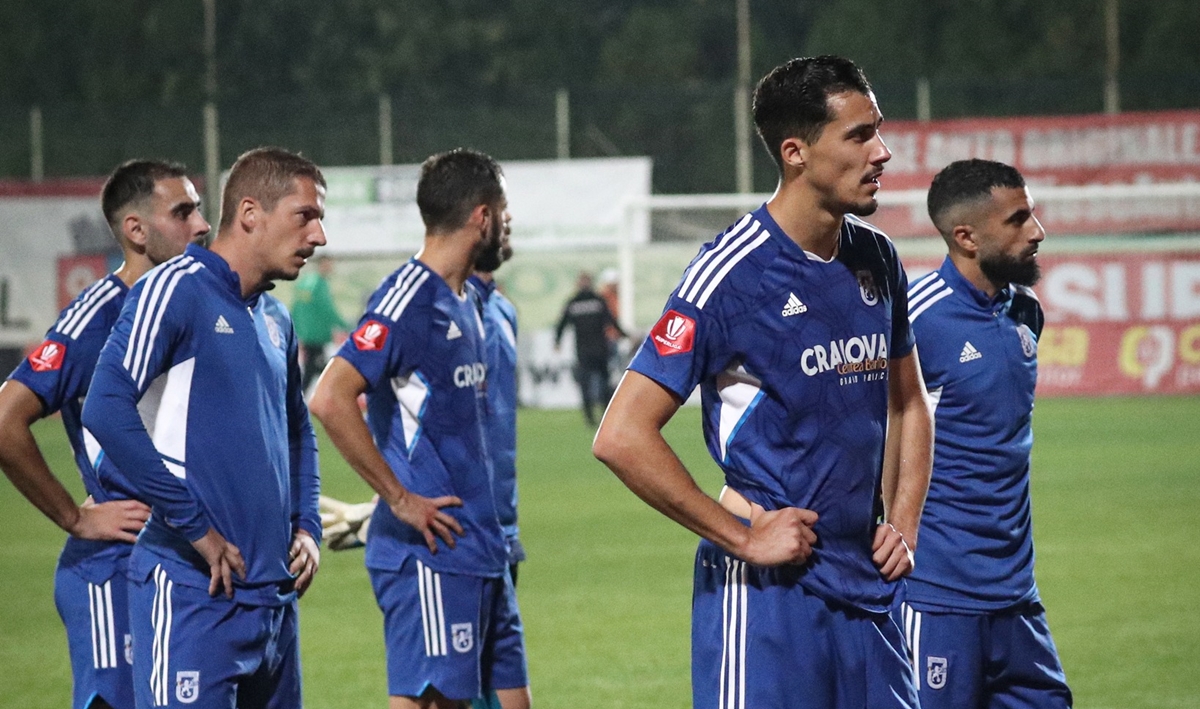 Achim (foto, în stânga) şi-a câştigat locul în echipa etapei a 12-a (Foto: Facebook FCU)