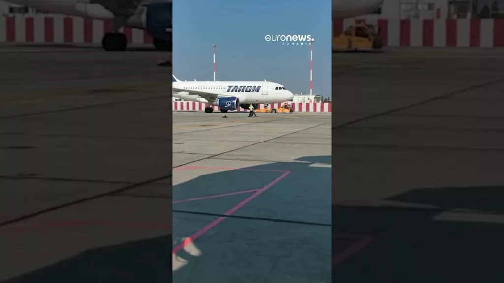 (VIDEO) Incident pe Aeroportul Otopeni: O femeie a fugit cu copilul mic pe pistă pentru a prinde avionul
