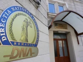 Bărbat reţinut de DNA după ce a fost prins în flagrant când primea 20.000 de euro de la o rudă a unei persoane trimise în judecată, promiţând că va interveni la judecători pentru a înlătura controlul judiciar şi a obţine achitarea