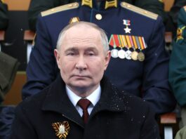 Putin participă la parada militară (Mihail Klimentyev/Sputnik/Reuters)