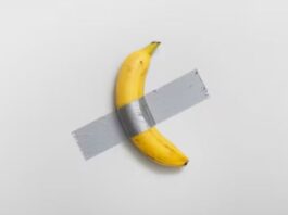 Celebra banană lipită cu bandă adezivă pe perete s-a vândut cu 6,2 milioane de dolari